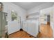 Laundry room features washer, dryer, water heater, and shelving at 3746 Gladney Dr, Atlanta, GA 30341