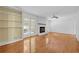 Bright living room features hardwood floors, fireplace, and access to sunroom at 3746 Gladney Dr, Atlanta, GA 30341