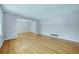 Spacious living room with hardwood floors and chandelier, perfect for entertaining guests at 3746 Gladney Dr, Atlanta, GA 30341
