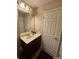 Bathroom featuring a light countertop and large mirror at 1604 Haven Cir, Douglasville, GA 30135