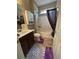 Bathroom with a shower-tub combo, vanity, and toilet at 1604 Haven Cir, Douglasville, GA 30135