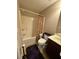 Bathroom featuring a shower and tub combo with a floral curtain at 1604 Haven Cir, Douglasville, GA 30135