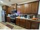 This kitchen is equipped with stainless steel appliances, plenty of countertop space, and ample cabinet storage at 1604 Haven Cir, Douglasville, GA 30135