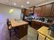 Stylish kitchen with an island and seating, complemented by modern appliances and ample cabinet space at 1604 Haven Cir, Douglasville, GA 30135