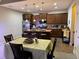 Inviting living and kitchen area perfect for entertaining and featuring a dining table at 1604 Haven Cir, Douglasville, GA 30135