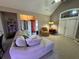 Living room featuring a fireplace, sofa and access to the patio at 1604 Haven Cir, Douglasville, GA 30135