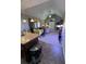 Open-concept living room featuring vaulted ceilings and fireplace at 1604 Haven Cir, Douglasville, GA 30135