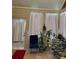 Bright sunroom with tile flooring and access to outdoor space at 1604 Haven Cir, Douglasville, GA 30135