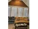 Relaxing sunroom featuring comfortable seating and bright natural light at 1604 Haven Cir, Douglasville, GA 30135