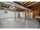 Spacious unfinished basement with studded walls and exposed ceiling for a customizable living area or extra storage at 3888 Lindley Cir, Powder Springs, GA 30127