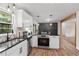 Well-equipped kitchen with sleek countertops and stainless steel appliances for effortless cooking at 3888 Lindley Cir, Powder Springs, GA 30127