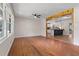 Open-concept living space showcasing hardwood floors and access to a modern kitchen at 3888 Lindley Cir, Powder Springs, GA 30127