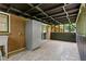 Covered patio with brick wall, sink, and refrigerator is perfect for outdoor entertainment and relaxation at 3888 Lindley Cir, Powder Springs, GA 30127