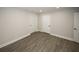 Bedroom with light gray wood floors and neutral walls featuring recessed lighting at 662 Gary Nw Rd, Atlanta, GA 30318