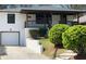 Attractive bungalow with a covered front porch, driveway, and tidy landscaping at 662 Gary Nw Rd, Atlanta, GA 30318