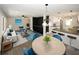 Spacious open-concept living area with stylish furniture, hardwood floors, and abundant natural light at 662 Gary Nw Rd, Atlanta, GA 30318