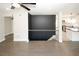 Open concept living area with hardwood floors, modern finishes, and a view into the kitchen at 662 Gary Nw Rd, Atlanta, GA 30318