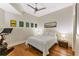 Cozy bedroom with hardwood floors, modern decor, and a comfortable bed at 1080 Peachtree Ne St # 1208, Atlanta, GA 30309