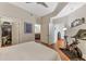 Comfortable bedroom with hardwood floors, en suite bathroom, and walk-in closet access at 1080 Peachtree Ne St # 1208, Atlanta, GA 30309