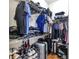 Well-organized walk-in closet featuring shelving, hanging racks, and storage for shoes and luggage at 1080 Peachtree Ne St # 1208, Atlanta, GA 30309