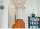 Inviting hallway featuring hardwood floors and modern finishes, leading to various rooms at 1080 Peachtree Ne St # 1208, Atlanta, GA 30309