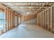 Unfinished basement with exposed beams and large windows for natural light at 173 Parkview Place Dr, Mcdonough, GA 30253