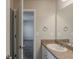 Well-lit bathroom featuring a sink with granite countertop and neutral walls at 173 Parkview Place Dr, Mcdonough, GA 30253