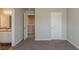Bedroom featuring an ensuite bath, closet and neutral colors at 173 Parkview Place Dr, Mcdonough, GA 30253