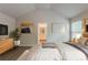 Spacious main bedroom with vaulted ceiling, ensuite bathroom, and ample natural light at 173 Parkview Place Dr, Mcdonough, GA 30253