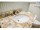 A close-up shot of a bathroom vanity with granite countertop and traditional fixtures at 2343 Hunting Valley Dr, Decatur, GA 30033