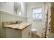 A close-up shot of a bathroom vanity with granite countertop and traditional fixtures at 2343 Hunting Valley Dr, Decatur, GA 30033