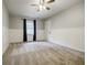 Bedroom with carpet, natural light, white trim and ceiling fan at 2343 Hunting Valley Dr, Decatur, GA 30033