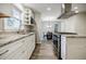 Modern kitchen features granite countertops, stainless steel appliances, and ample cabinet space at 2343 Hunting Valley Dr, Decatur, GA 30033