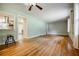 Open living room with hardwood floors and view of kitchen at 2343 Hunting Valley Dr, Decatur, GA 30033