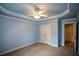 Bedroom with double closet and door to another room at 3423 Mulberry Lane Ct, Dacula, GA 30019
