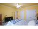 A spacious bedroom is displayed with a double bed and ample natural light through a window at 3423 Mulberry Lane Ct, Dacula, GA 30019