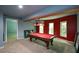 Finished basement game room featuring a pool table, three windows, and unique color scheme at 3423 Mulberry Lane Ct, Dacula, GA 30019