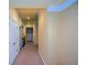 Upstairs hallway features carpeted floor and neutral paint, connecting bedrooms and bathrooms at 3423 Mulberry Lane Ct, Dacula, GA 30019