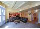Spacious living room featuring a decorative ceiling, and open access to the kitchen and dining areas at 3423 Mulberry Lane Ct, Dacula, GA 30019