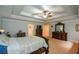 Comfortable main bedroom showcasing neutral carpet and a large dresser at 3423 Mulberry Lane Ct, Dacula, GA 30019