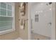 Bathroom featuring a walk-in shower with white subway tile and a mosaic tile floor at 659 Holcomb Bridge Rd, Norcross, GA 30071