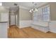 Dining area features hardwood floors, built in seating with a large window at 659 Holcomb Bridge Rd, Norcross, GA 30071