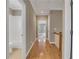Second-floor hallway providing access to a bathroom and bedroom at 659 Holcomb Bridge Rd, Norcross, GA 30071
