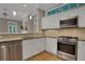 Bright kitchen featuring stainless steel appliances and granite countertops at 659 Holcomb Bridge Rd, Norcross, GA 30071