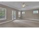 Expansive bedroom boasts lots of light and access to a private outdoor balcony at 659 Holcomb Bridge Rd, Norcross, GA 30071