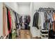 Walk-in closet with ample storage space for clothing and accessories at 115 Ivey Way, Woodstock, GA 30188