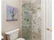 The bathroom features a glass-enclosed walk-in shower and modern design at 299 Azalea Cir, Cumming, GA 30040