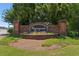 Wynngate community entrance sign featuring brickwork and colorful landscaping at 299 Azalea Cir, Cumming, GA 30040