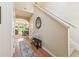 Inviting foyer with hardwood floors and staircase leading to living and dining areas at 299 Azalea Cir, Cumming, GA 30040