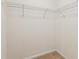 Walk-in closet providing space for organization with a minimalist design at 299 Azalea Cir, Cumming, GA 30040